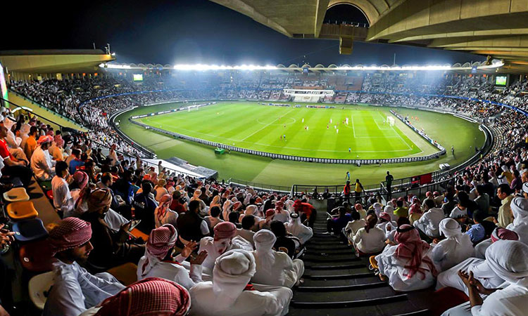 A floodlit football stadium in Abu Dhabi on a UAE Football Association matchday