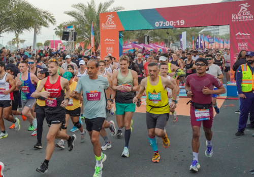 Runners leaving the start line