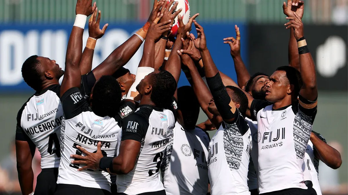 A team huddle before kick off at the Emirates Dubai 7s